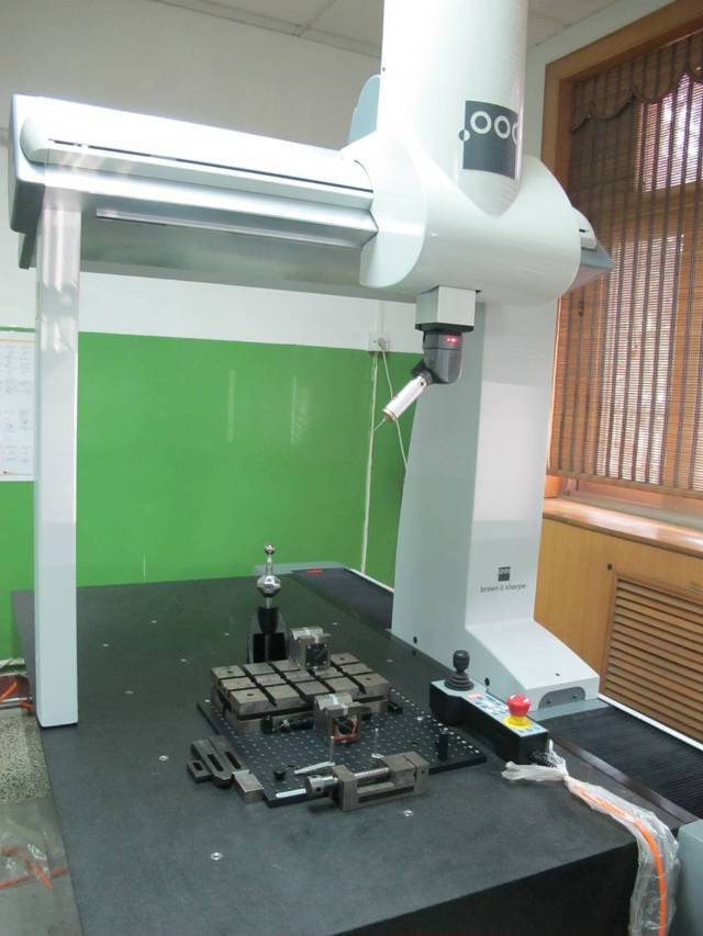 Automatic coordinate measuring instrument